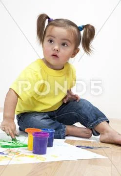Baby girl artist Stock Photos