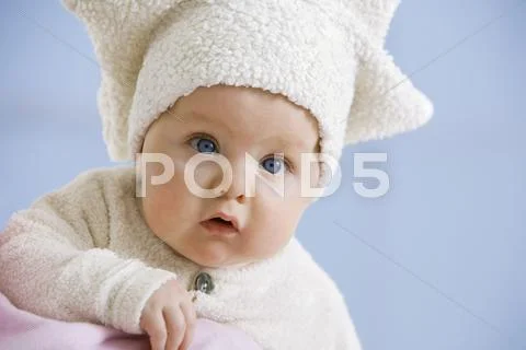 Baby Girl In Star Shape Hat, Portrait