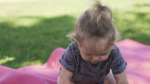 Baby on the grass Video stock 78359513