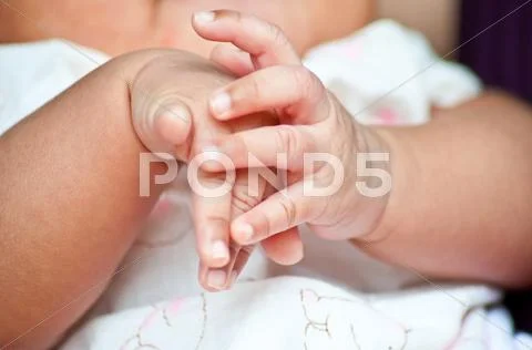 Baby hand Stock Photos