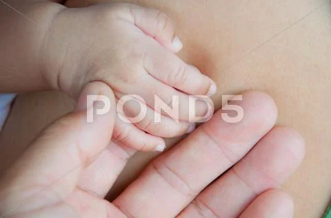 Baby hand Stock Photos