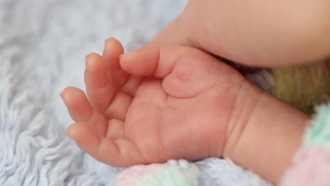 Baby hands close up Stock Footage 106196621