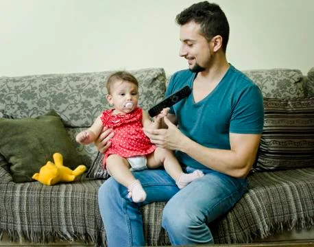 Baby have the control Stock Photos