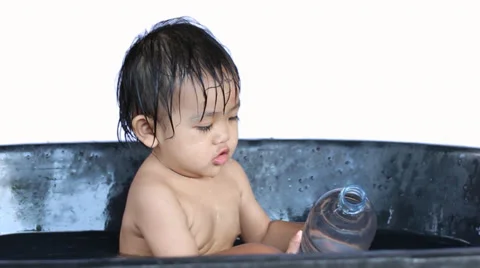 Baby having fun in the bath on with background Stock Footage 37871471