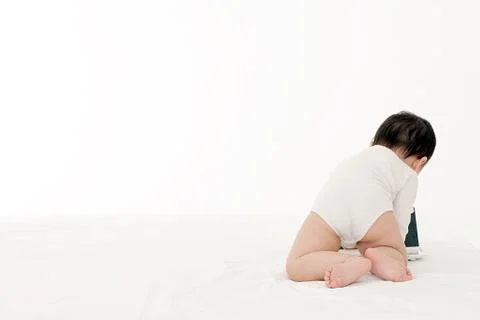 A baby having fun playing Stock Photos