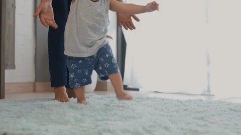 Baby at home first steps Video stock 104609643