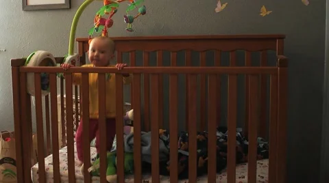Baby Jumping in Crib Stock Footage 40340477