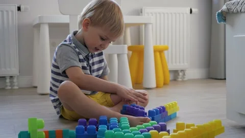 Baby Kid Playing Construction Plastic Cubes Kit Toys In Children Room On Floor Stock Footage 185509448