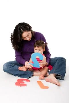 Baby learning to count Stock Photos