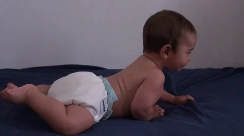 Baby learning to crawl 2 Stock Footage 40016175