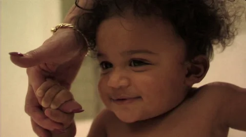 Baby learning to walk Stock Footage 43696786