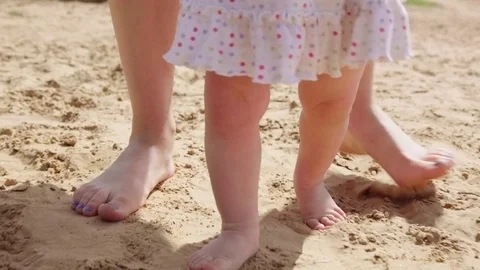 Baby learning to walk Stock Footage 78516961