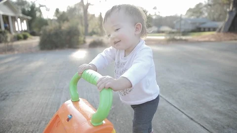 Baby Learning to Walk in Slow Motion Stock Footage 122834035