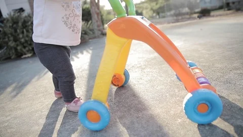 Baby Learning to Walk in Slow Motion Stock Footage 122834191