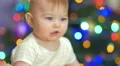 The baby look and play with toy. Close-up portrait view 4k or 4k+ Resolution