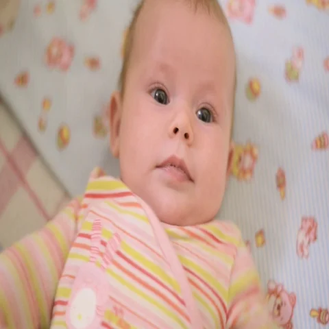 Baby looking at the camera Stock Footage 69330028