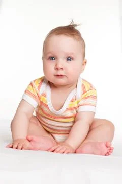 Baby looking into the camera. Stock Photos