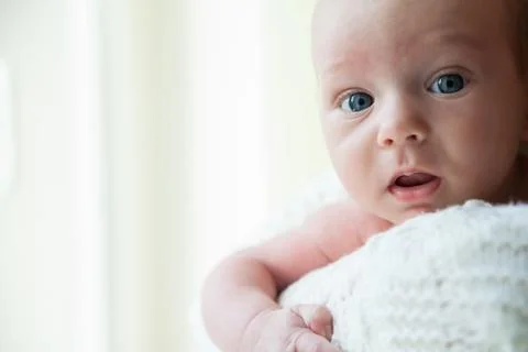 Baby looking at camera Stock Photos