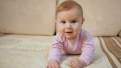 Baby lying on belly small Stock Footage 84695065