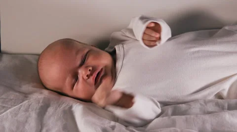 The baby is lying on a blanket Stock Footage 45845735