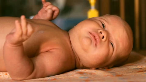 The baby is lying on a blanket Stock Footage 46062061