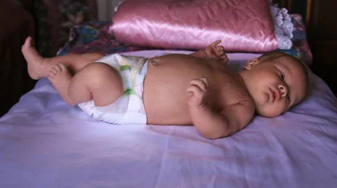 The baby is lying on a blanket Stock Footage 46204260