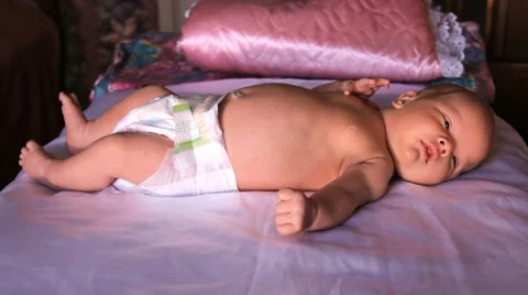 The baby is lying on a blanket Stock Footage 46204281