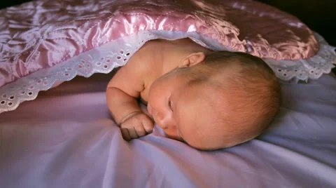 The baby is lying on a blanket Stock Footage 46726283