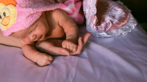 The baby is lying on a blanket Stock Footage 46726955