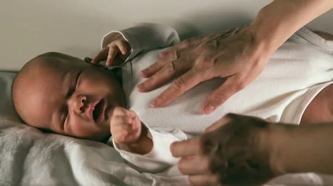 The baby is lying on a blanket Stock Footage 46912879