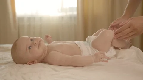 The baby is lying on the changing table Stock Footage 146243681