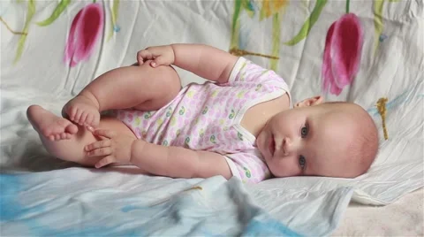 Baby lying on its side Stock Footage 65388602