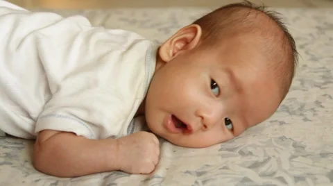 Baby lying prone Stock Footage 45856483