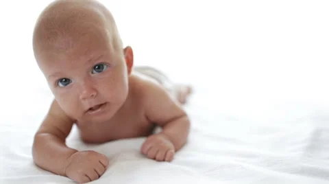 Baby lying on white background Stock-Footage 44234639
