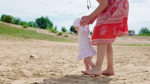 Baby is making the first steps Stock Footage 78566510