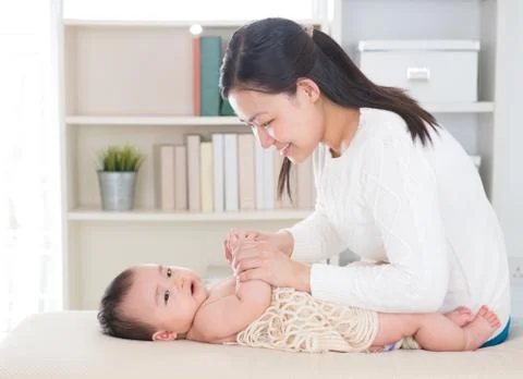 Baby massage. Stock Photos