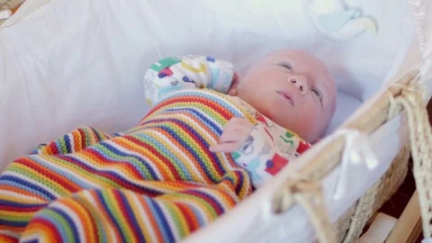 Baby in Moses Basket Stock Footage 85197868