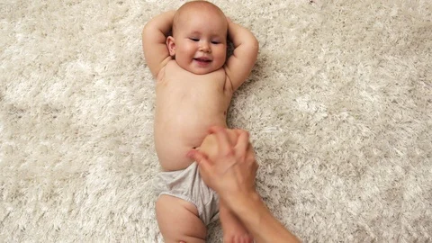 Baby with mum doing exercise Video stock 93598354