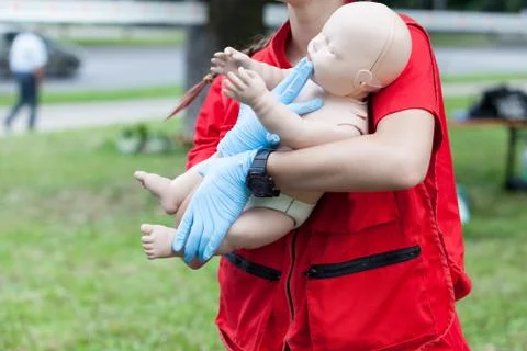 Baby or child first aid and CPR Foto stock