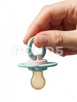 Baby pacifier held in hand, silicone nipple and plastic guard PSD Template