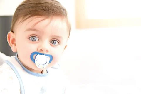Baby with pacifier Stock-Fotos