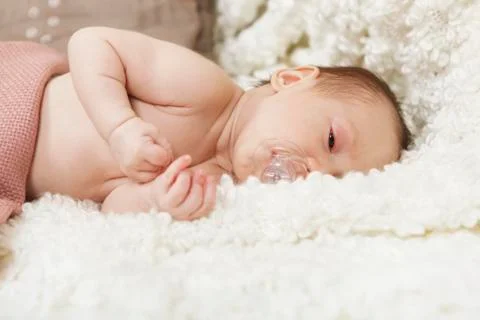 Baby with pacifier Fotos de archivo