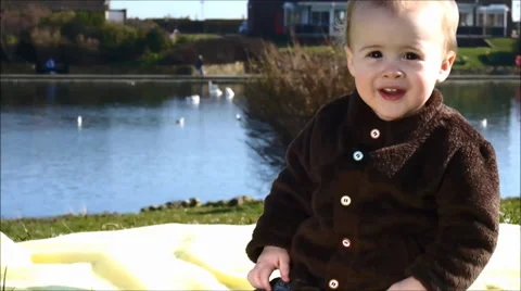 Baby in Park Video stock 35989031