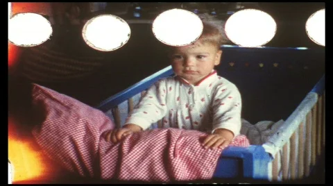 Baby in pen (vintage 8 mm amateur film Stock Footage