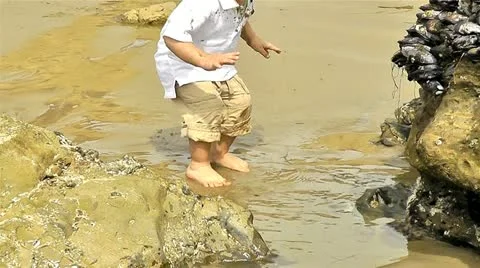 Baby play on the beach 2 Stock Footage