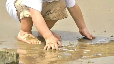 Baby play on the beach Stock Footage