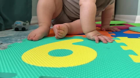 Baby on Play Mat Stock Footage 245690156