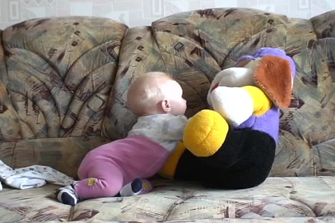 Baby play with toy  Stock Footage 1077111