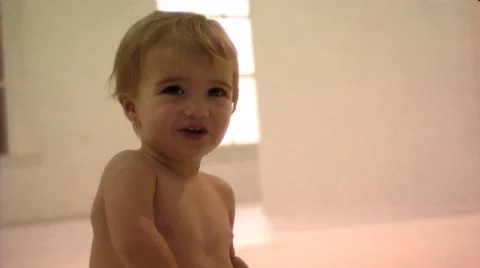 Baby playing with ball Stock Footage 43696402