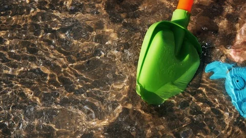 A baby playing on the beach Video stock 123385836